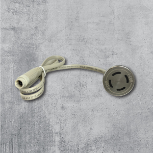 A photo of a TruTOUCH® Pro LED sensor overlaid on a concrete background